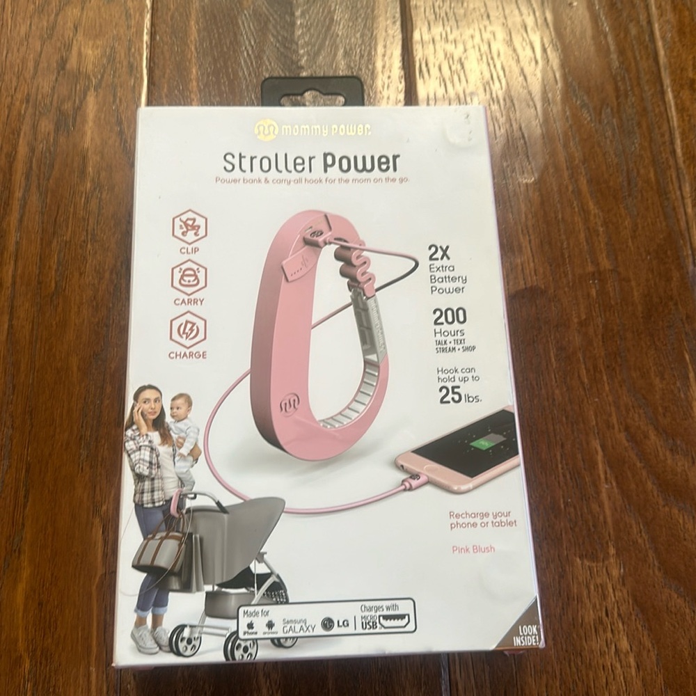 Stroller clip with phone charger